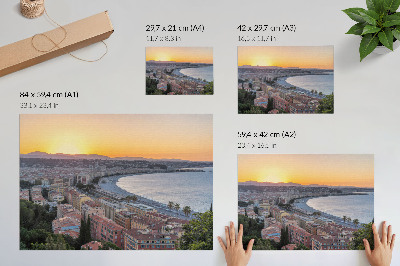 Affiche et poster Vue de la ville au coucher du soleil sur la mer