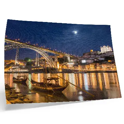 Affiche décorative pont illuminé la nuit avec une ville animée par des bateaux