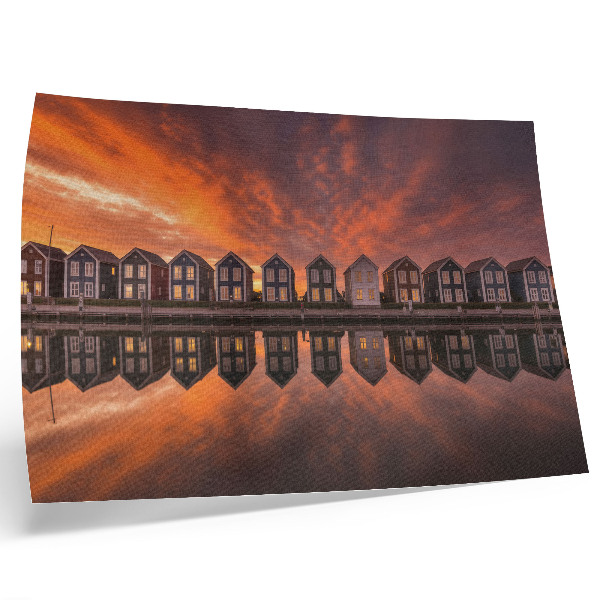 Affiche Maisons colorées au bord de l'eau sous la lumière du coucher de soleil