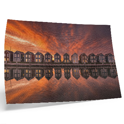 Affiche Maisons colorées au bord de l'eau sous la lumière du coucher de soleil