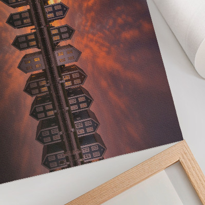 Affiche Maisons colorées au bord de l'eau sous la lumière du coucher de soleil
