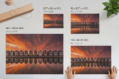 Affiche Maisons colorées au bord de l'eau sous la lumière du coucher de soleil