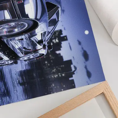 Affiche représentant une voiture de sport dans un paysage urbain de nuit