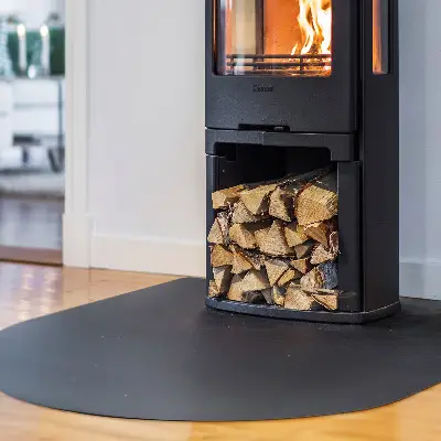 Plaque de protection pour poêle semi-ovale en métal noir