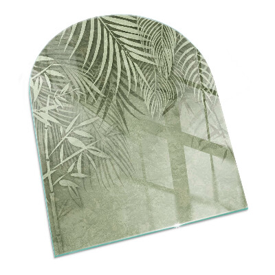 Plaque verre pour poêle semi-ovale Feuilles tropicales en arrière-plan