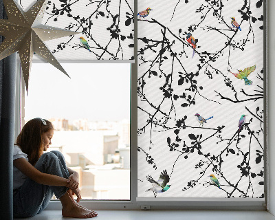 Store enrouleur avec motif d'oiseaux sur les branches