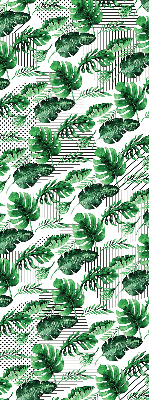 Store intérieur fenêtre avec feuilles tropicales