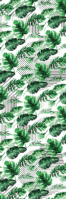 Store intérieur fenêtre avec feuilles tropicales