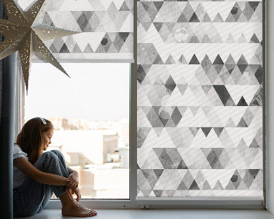 Store enrouleur de motif triangulaire gris