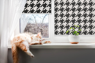 Store intérieur au motif géométrique