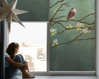 Store enrouleur avec motif d’oiseaux sur une branche