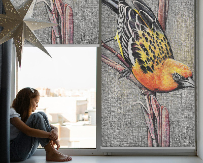 Store enrouleur avec motif d’un oiseau sur une branche