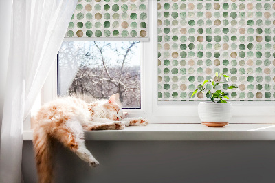 Store enrouleur occultant avec cercles verts