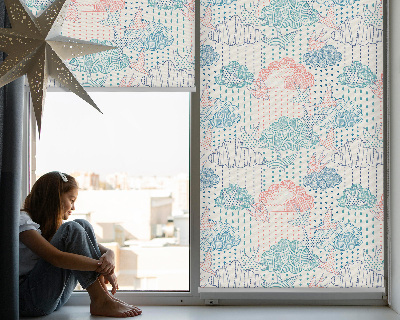 Store enrouleur occultant des nuages colorés avec des motifs