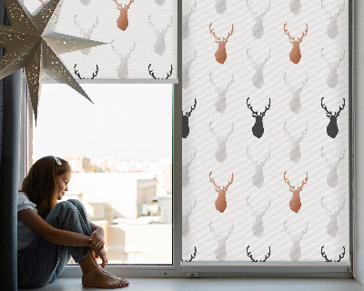 Store enrouleur occultant avec têtes de cerf dessinées