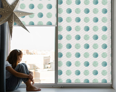 Store occultant fenetre avec des points turquoise sur fond blanc