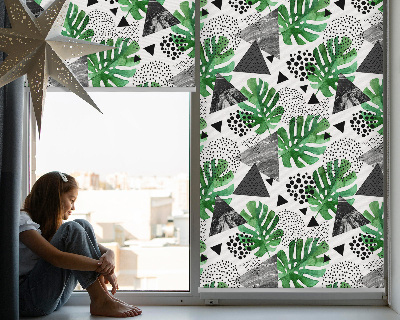 Store occultant fenêtre avec motifs de feuilles, triangles et points