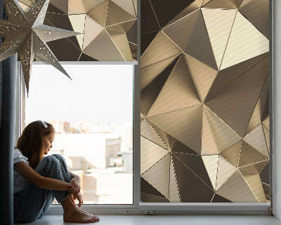 Store enrouleur occultant avec motif triangles d'or