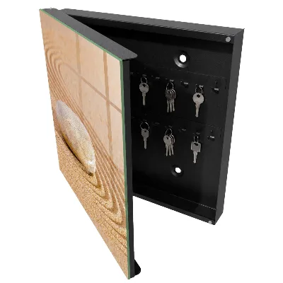 Armoire à clés décorative Une pierre dans le sable