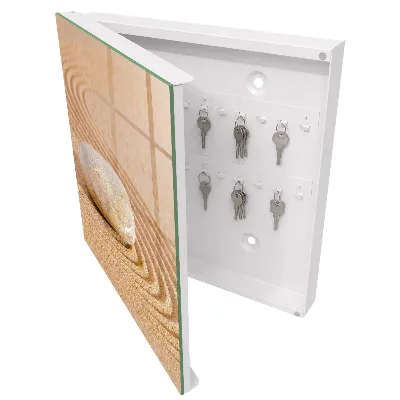 Armoire à clés décorative Une pierre dans le sable