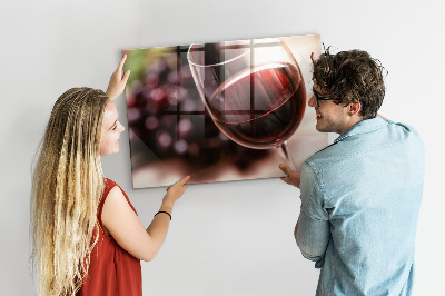 Tableau aimanté Un verre de vin rouge