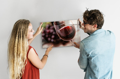 Tableau aimanté Un verre de vin rouge