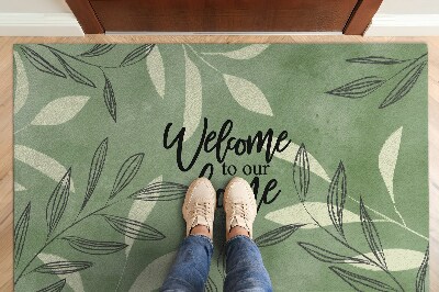Tapis d'entrée Welcome to our home Motif feuille