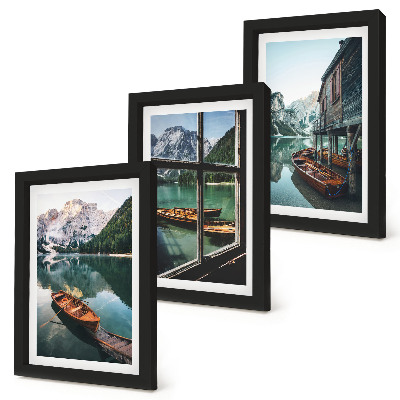 Mur de cadres Vue d'un lac de montagne avec des bateaux et une maison au bord de l'eau