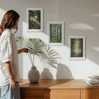 Ensemble de 3 tableaux représentant une forêt verdoyante avec des rayons de lumière et un chemin forestier