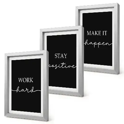 Mur de cadres avec slogans de motivation élégants sur fond noir