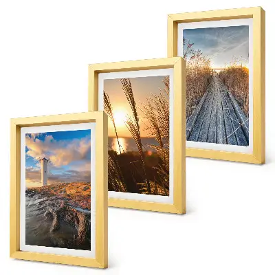 Lot de 3 tableaux représentant une vue sur un phare en bord de mer avec de l'herbe et une jetée en bois