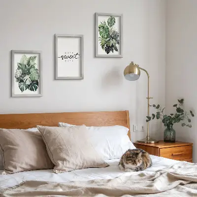 Ensemble de 3 tableaux représentant des plantes vertes avec l'inscription « Douce maison »