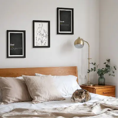 Mur de cadres dessins au trait sur le thème de la famille illustrant la définition de l'amour et de la paternité