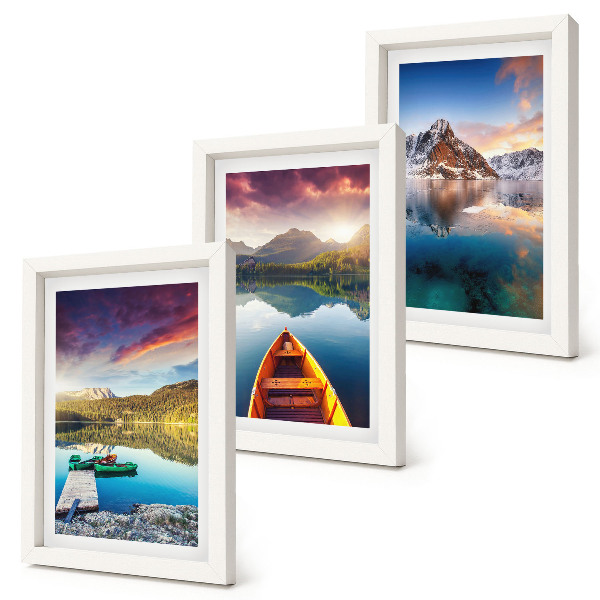 Mur de cadres Des lacs tranquilles avec des paysages de montagne et un bateau