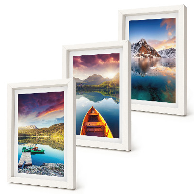 Mur de cadres Des lacs tranquilles avec des paysages de montagne et un bateau