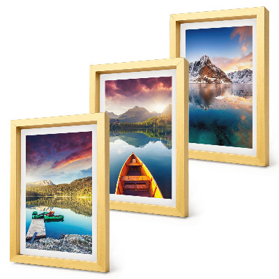 Mur de cadres Des lacs tranquilles avec des paysages de montagne et un bateau
