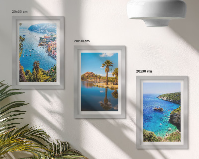 Mur de cadres Vue sur la mer avec des palmiers et de l'eau bleue