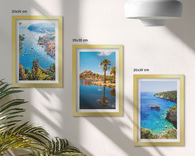 Mur de cadres Vue sur la mer avec des palmiers et de l'eau bleue