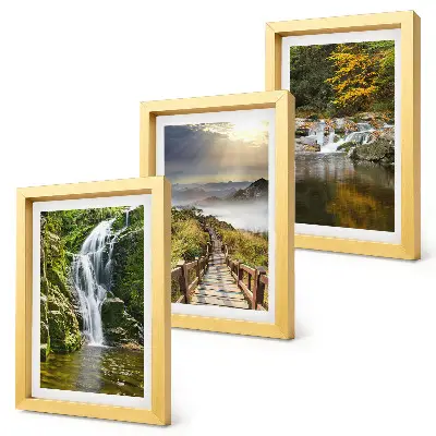 Mur de cadres représentant des cascades, des montagnes, des chemins de nuages et des paysages d'automne