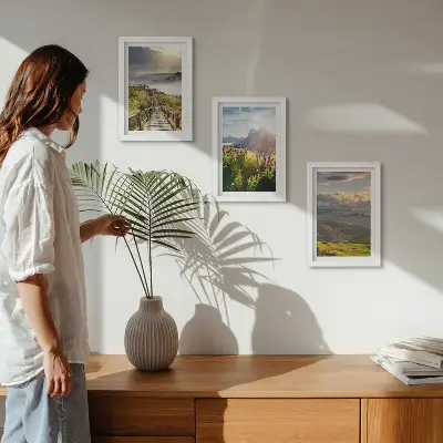Ensemble de 3 tableaux représentant des paysages de montagne avec des fleurs, un ciel et un chemin