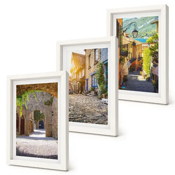 Mur de cadres rues charmantes bordées de bâtiments en pierre et de portails
