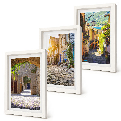 Mur de cadres Des rues charmantes bordées de bâtiments en pierre et de portails