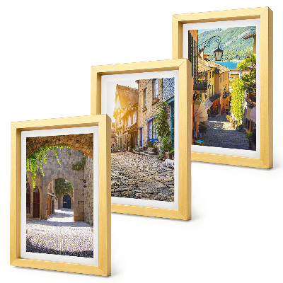 Mur de cadres Des rues charmantes bordées de bâtiments en pierre et de portails