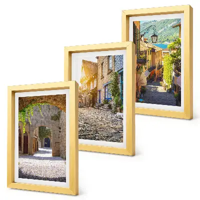 Mur de cadres rues charmantes bordées de bâtiments en pierre et de portails