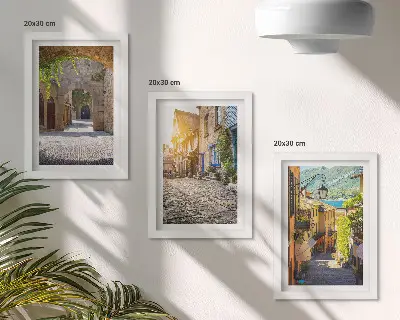 Mur de cadres rues charmantes bordées de bâtiments en pierre et de portails