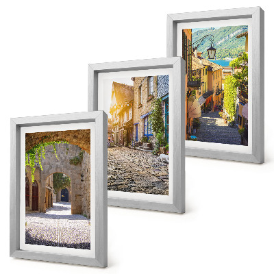 Mur de cadres Des rues charmantes bordées de bâtiments en pierre et de portails
