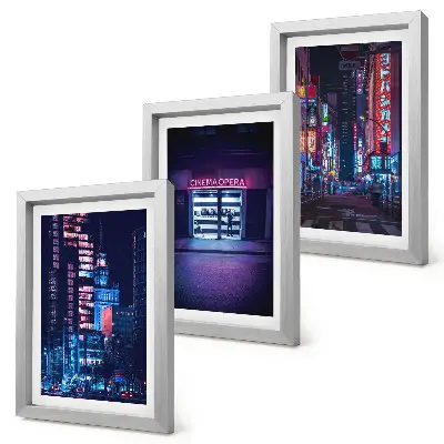 Ensemble de 3 tableaux représentant une ville nocturne avec des néons et une entrée de cinéma