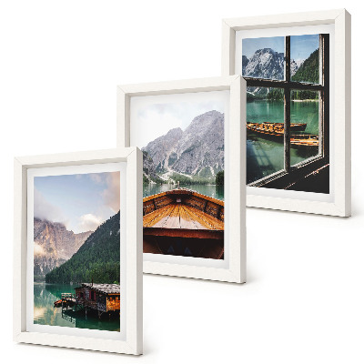 Mur de cadres Lac de montagne avec un bateau et des maisons en bois