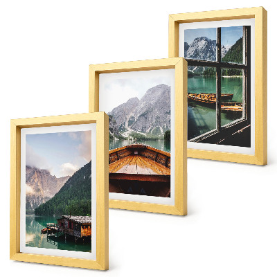 Mur de cadres Lac de montagne avec un bateau et des maisons en bois