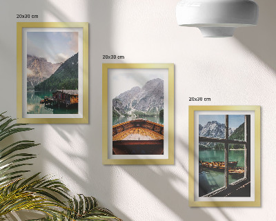 Mur de cadres Lac de montagne avec un bateau et des maisons en bois